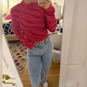 Super cute and soft red and pink zebra sweater!